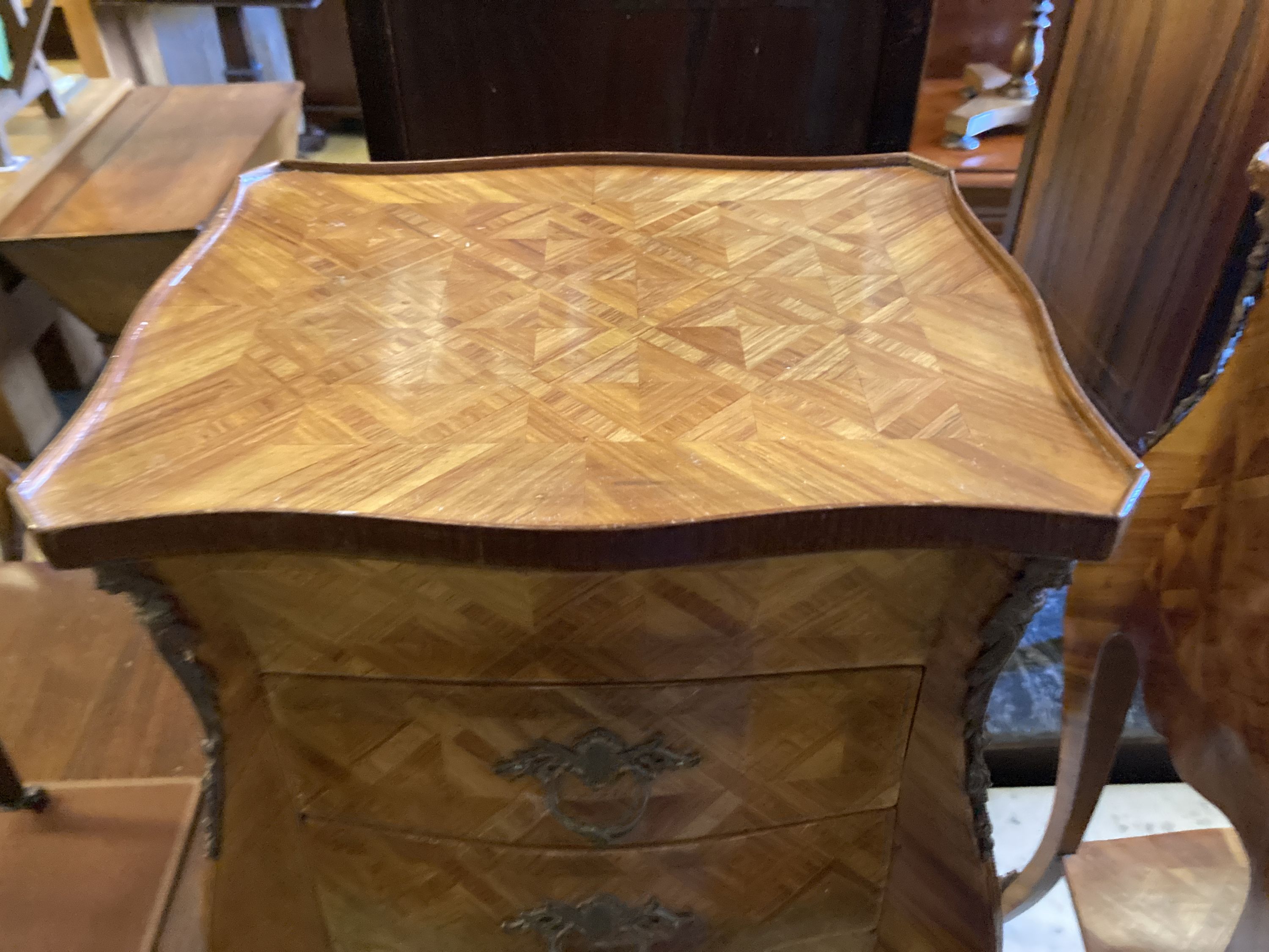 A pair of Louis VIX style parquetry and inlaid kingwood petit commodes (damage), width 34cm, depth 28cm, height 69cm